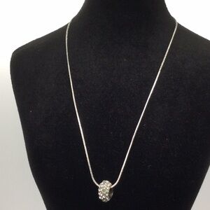 Woman’s Necklace Rhinestone Piece on a 16” Sliver chain.
